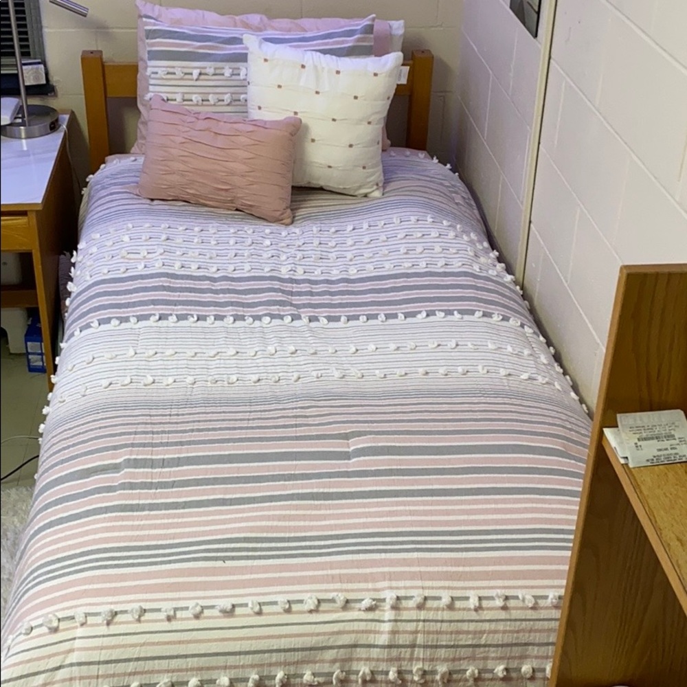 Comforter and two throw pillows